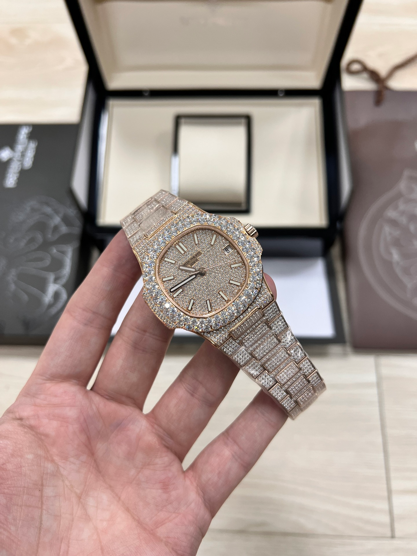 Patek Philippe Nautilus 5711/1R  with baguette/brilliant-cut diamonds.